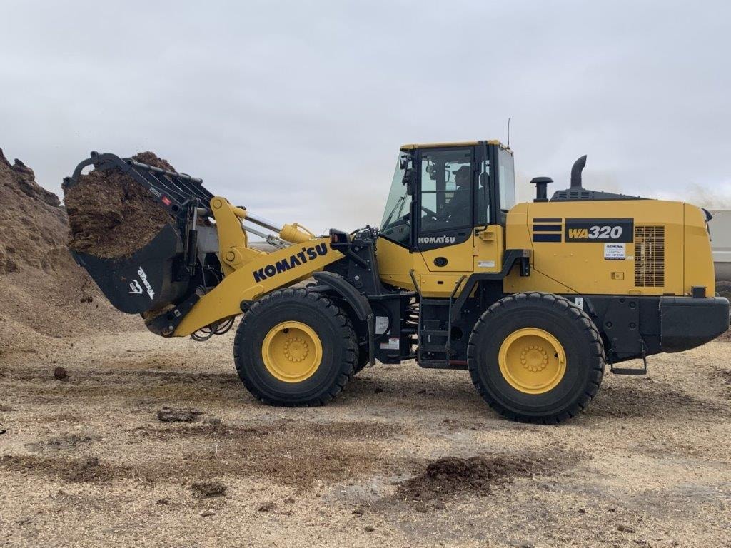 Heavy-duty grapple for with silage stoppers